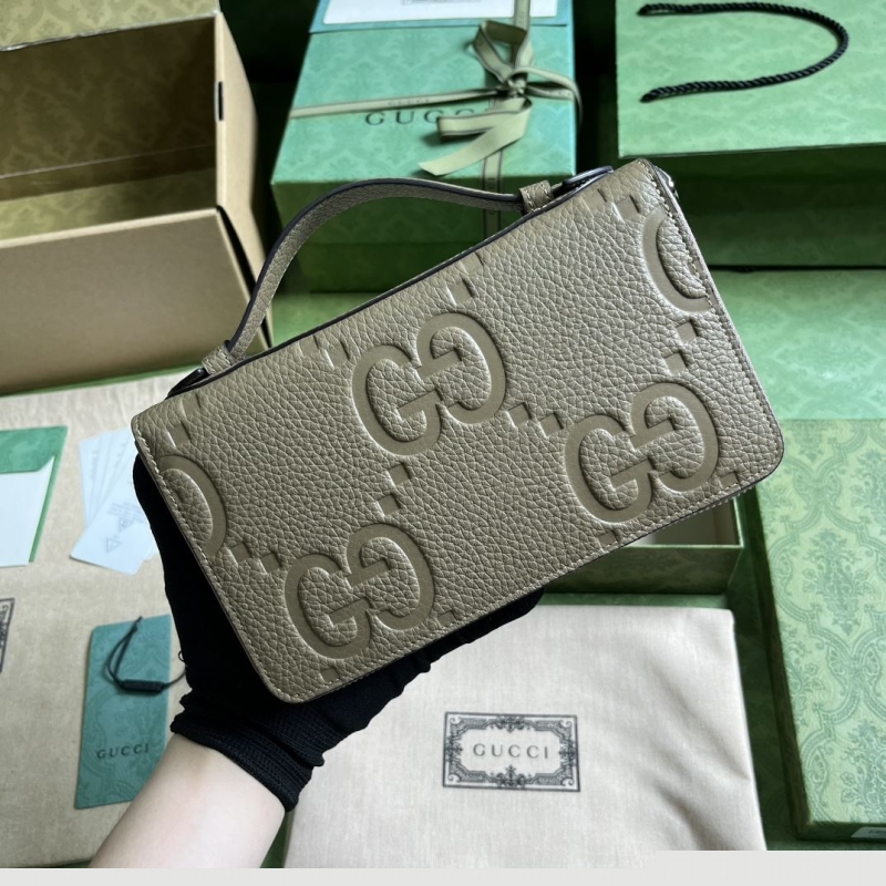 G*u*i clutch bags